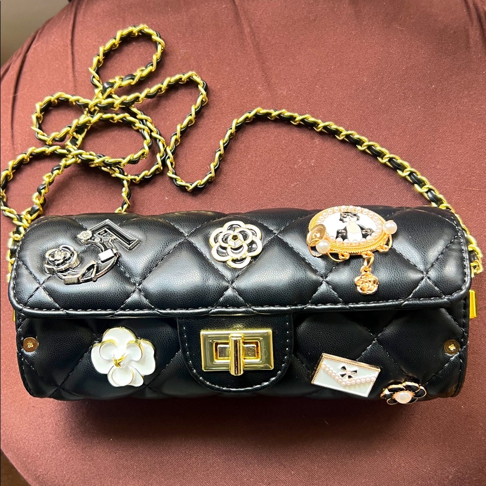 Luxury Black and Gold Cylindrical Clutch with Chain Strap